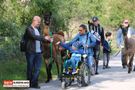 Menschen mit Lamas