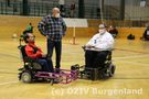 E-Rolli Fahrer auf dem Spielfeld
