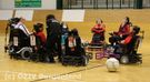 E-Rollifahrer bei Teambesprechung